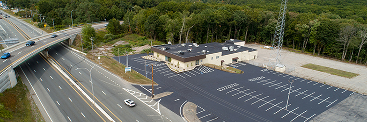 Sweeney Real Estate & Appraisal sells 20,000 s/f for $1.65 million and leases 2,820 s/f retail